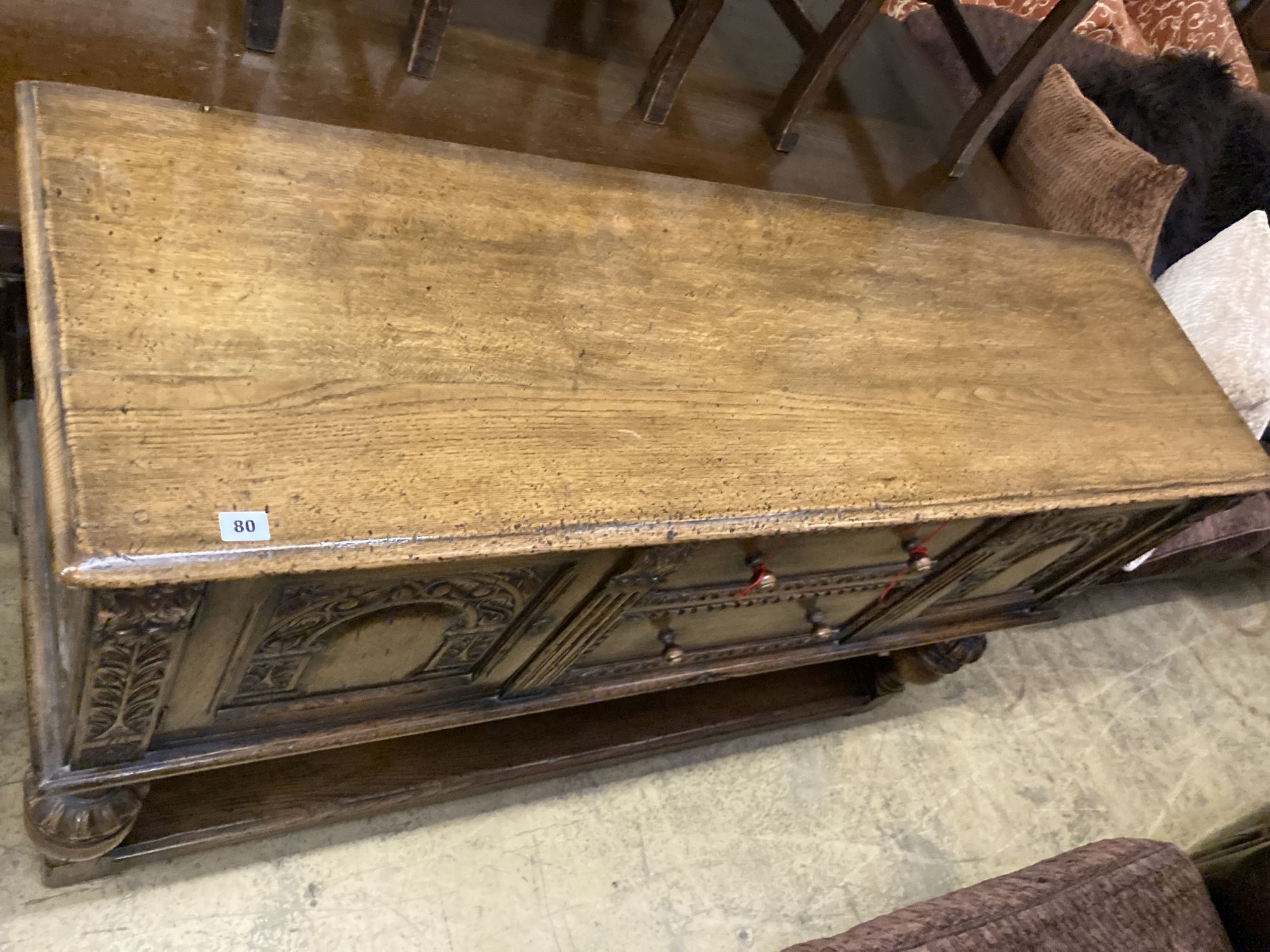 An 18th century style oak sideboard, length 150cm, depth 46cm, height 93cm